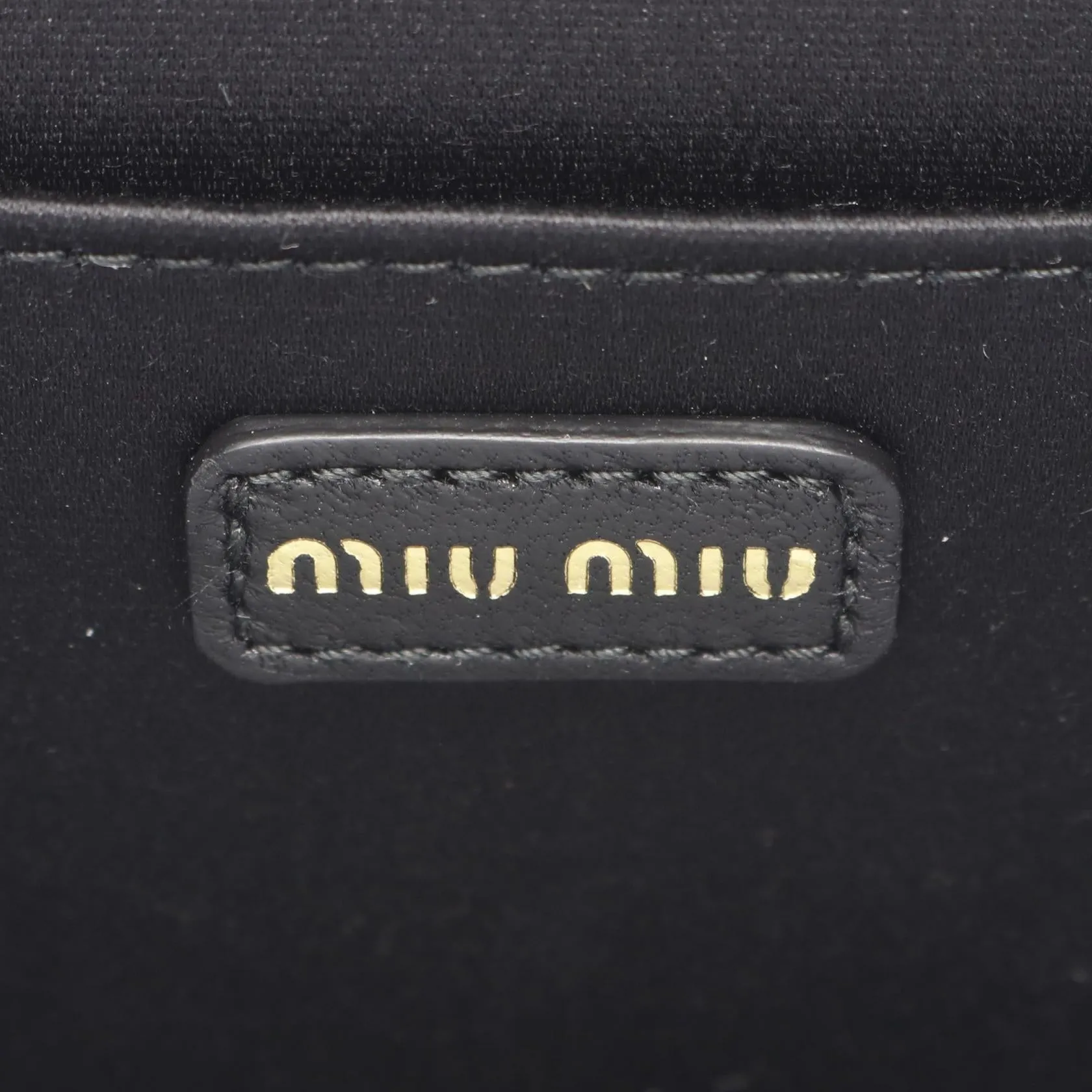 Miu Miu Leather Matelasse Micro Shoulder Bag